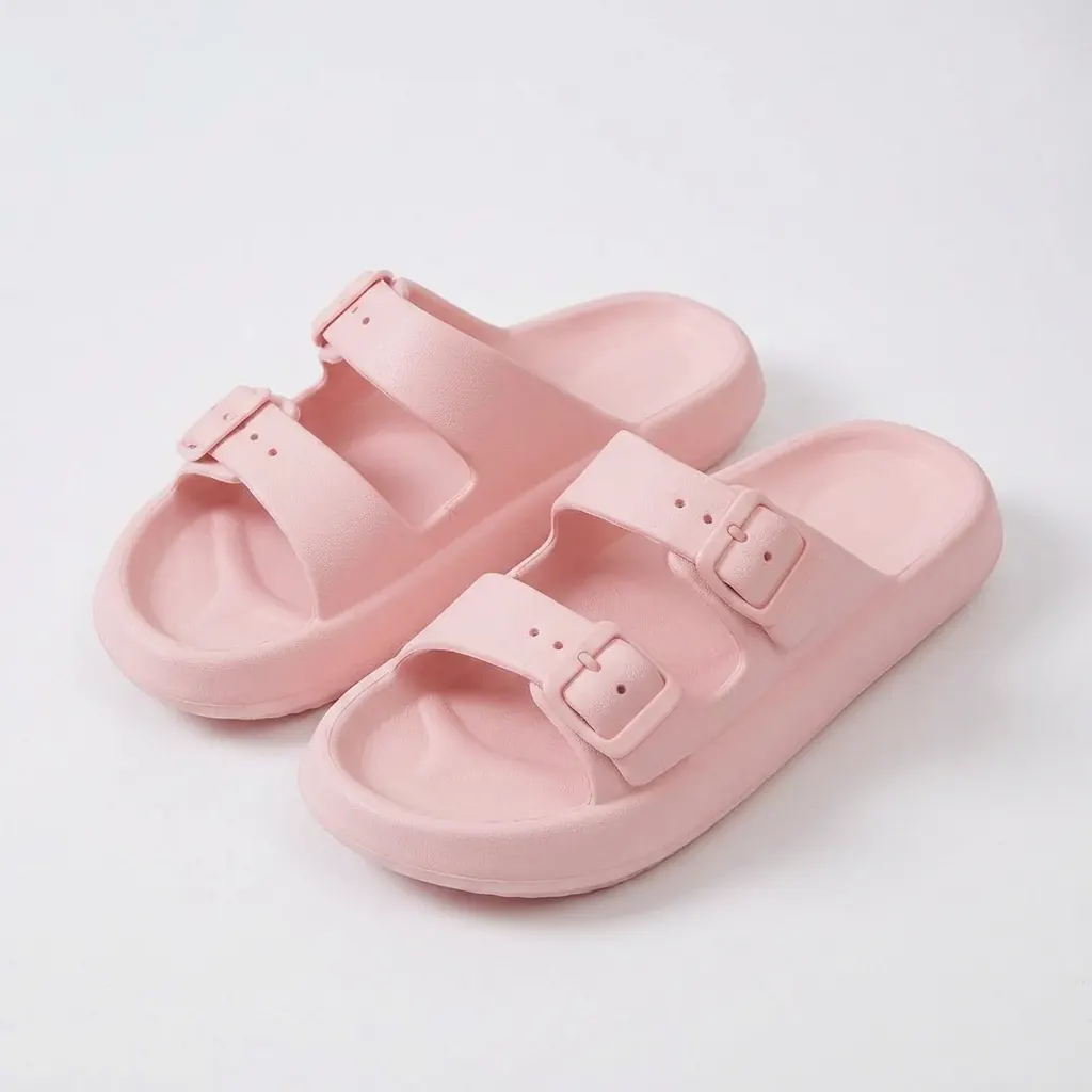 Pink Bloom sandals on white background